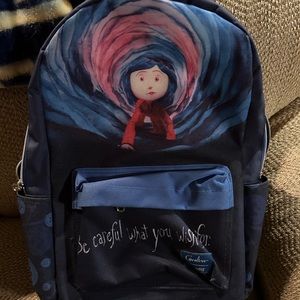 Coraline Loungefly backpack. Has wear. See pics.